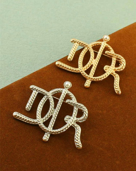 DR Brooch